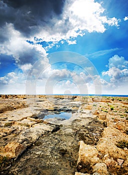 Rocks, sea and sky before storm