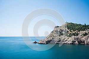 Rocks In The Sea stock photo. Scenery Landscape. No People. Beautiful landscape. Summertime. A sunny day without people. Bluewater