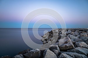 Rocks in the sea at sunset