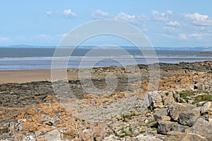The rocks on the seashore in Porthcawl, Wales.