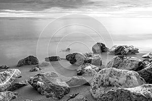 Rocks on the seaside near the beach Cha-am beach , Thailand,black and white