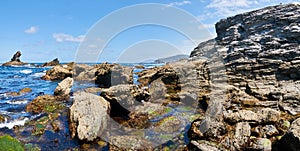 Rocks at the seaside in Pena Furada beach. Ortigueira. Coruna. Spain photo