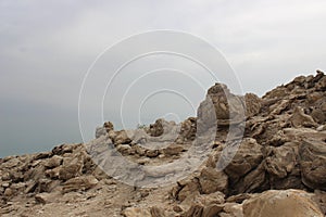 Rocks by the shore of the Dead Sea in Israel