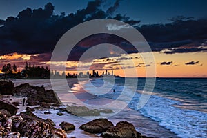 Rocks on shore with ocean waves