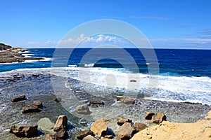 Rocks on the shoreline at Marsalforn, Gozo.