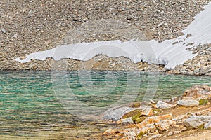 Rocks and snow in Laguna Turquesa photo