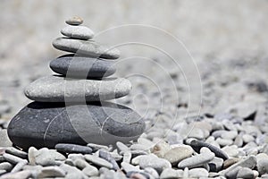 Rocks stacked on the beach photo