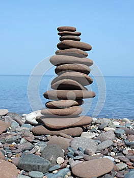 Rocks stacked on the beach of lake superior