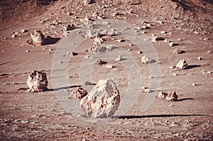 Rocks standing on the desert hills in Atacama desert, Chile