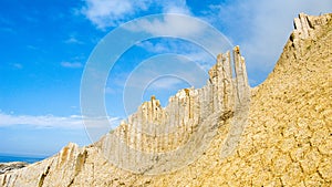 Rocks of Stolbchatiy cape in Kunashir, kuril islands Russia