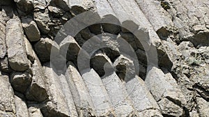 Rocks of Stolbchatiy cape in Kunashir, Kuril islands Russia