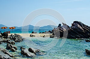 Rocks and stone beach Similan Islands with famous Sail Rock, Phang Nga Thailand nature landscape