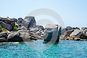 Rocks and stone beach Similan Islands with famous Sail Rock, Phang Nga Thailand nature landscape