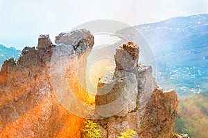 Rocks and Stones of Mountain with rays of sun and aerial view seaside