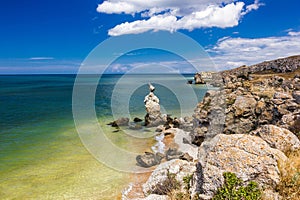 Rocks and stones on the seashore on a clear day