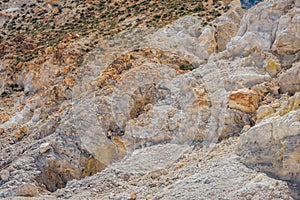 Rocks with sulfur crystals at Nisyros volcano Stefanos crater Greece