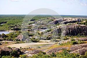 Rocks surrounded by green vegetation, Chaval city, Maranhao photo