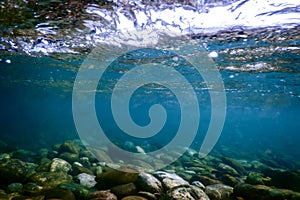 Rocks underwater on riverbed, rivers freshwater underwater, crystal clear water