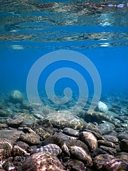 Rocks underwater on riverbed, rivers freshwater underwater, crystal clear water