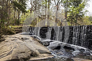 Rocks and waterfall at Historic Yates Mill Park