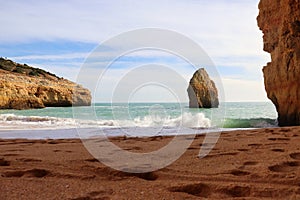 Rocks and waves in ocean on winter day in Portugal