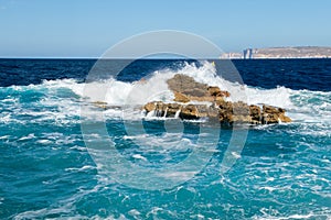 Rocks at windy day at Cirkewwa in Malta.