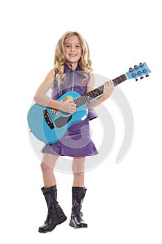 Rockstar child playing guitar photo