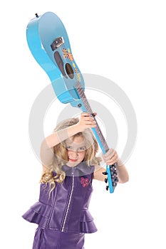 Rockstar child smashing her guitar peek