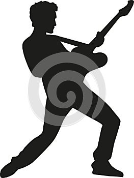 Rockstar silhouette with electric guitar photo