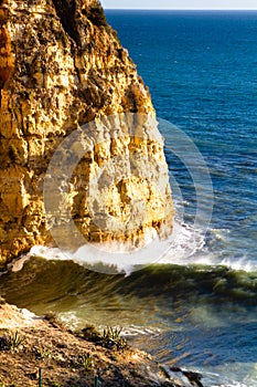 Rocky Algarve coast with waves