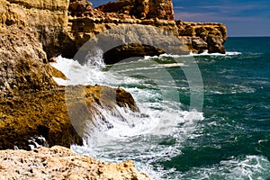 Rocky Algarve coast with waves