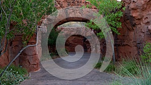 Rocky arches surrounded by greens in St.George city, Utah