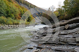 Rocky bank of Prut river in Yaremche city, western Ukraine