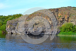 Rocky bank of the river Ishim, a rock in the shape of a crocodile's muzzle.