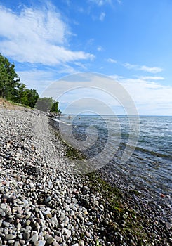 Steep rocky beach shoreline on Lake Ontario