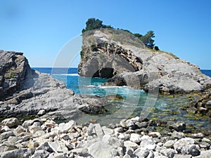 Rocky beach in adriatic sea in mintenegro