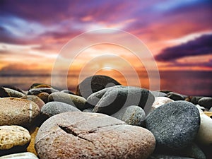 Rocky beach area during sunset.