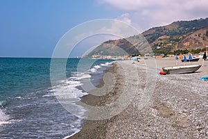Rocky beach in Campora San Giovani town photo