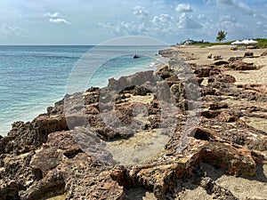 A rocky beach with clear turquoise water in Stuart, FL