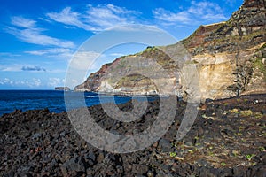 Rocky beach and cliffs at the west coast of Sao Miguel Island, Azores, Portugal