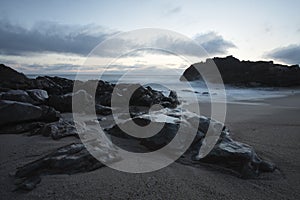 Rocky beach at dusk