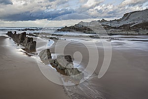 Rocky beach at dusk