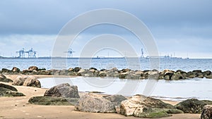 Rocky beach on the Gulf of Finland. Port of Sillamae