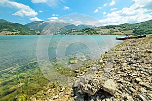 The rocky beach of Lake Turano photo