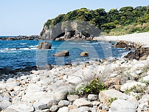 Rocky beach near Hakusan Domon natural arch on cape Ashizuri