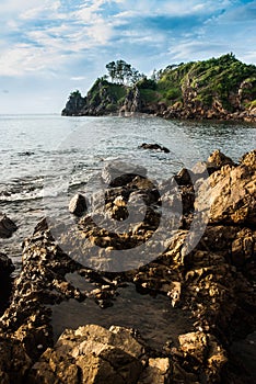 Rocky beach with sea water erosion