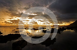 Rocky beach at sunset