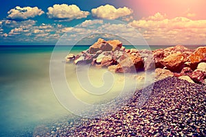 Rocky beach at sunset