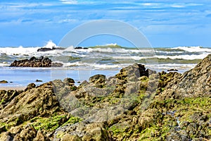 Rocky beach with waves crashing against the rocks