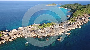 Rocky Cape and Similan Island Landscape Aerial Lookaround. HD Slowmotion. Andaman Sea, Thailand.